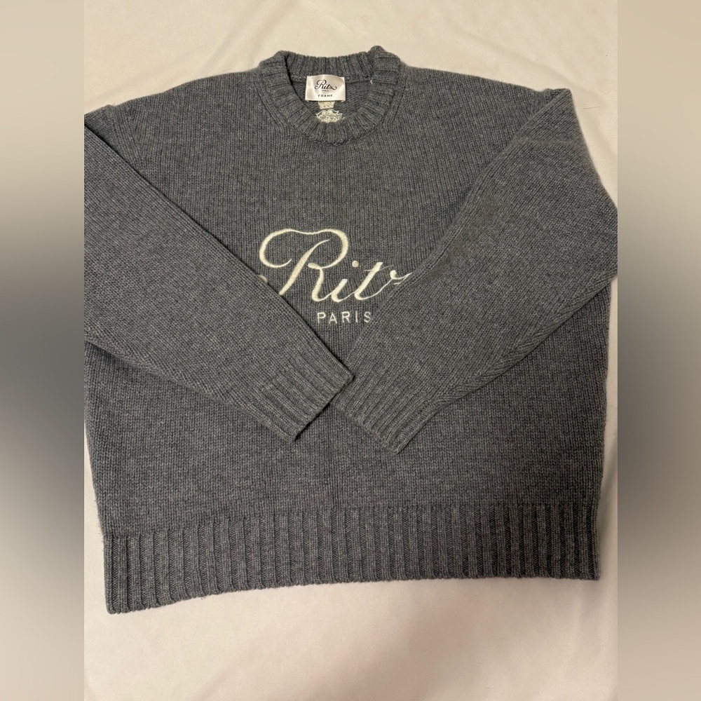 Frame x Ritz Cashmere sweater (unisex version) in Gray color.